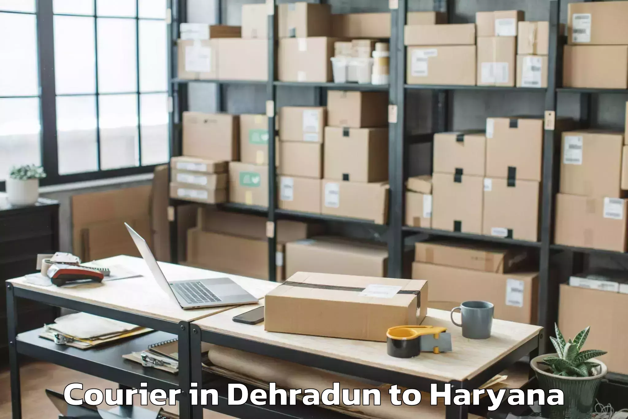 Trusted Dehradun to Udyog Vihar Courier